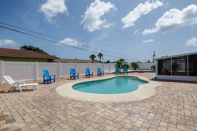 179 Ann Rustin Dr, Ormond Beach, FL 32176 - view of pool featuring a patio area, a fenced backyard, and a sunroom