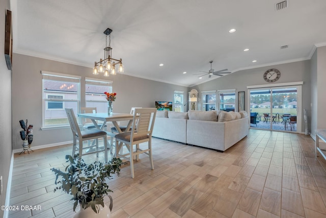 living room with light hardwood / wood-style flooring, a healthy amount of sunlight, and crown molding