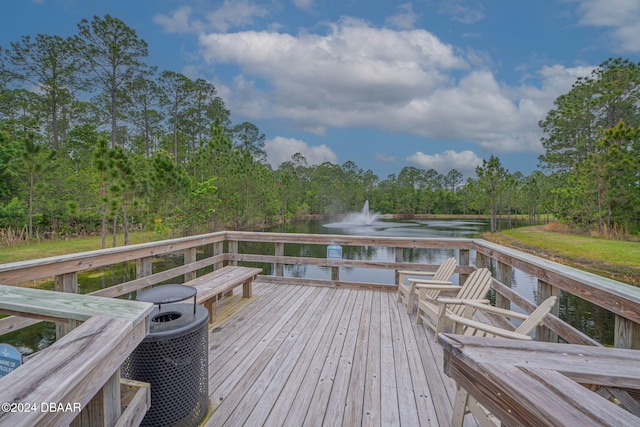 deck featuring a water view