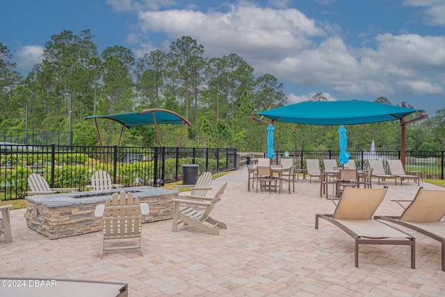 view of patio featuring a fire pit