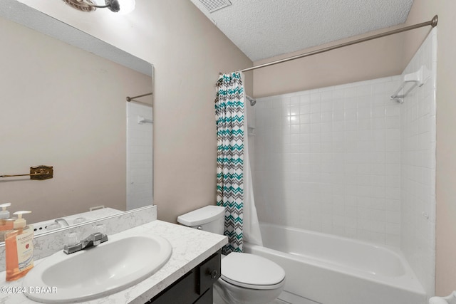 full bathroom featuring toilet, vanity, a textured ceiling, and shower / bath combo with shower curtain