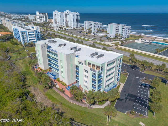 drone / aerial view with a water view and a city view