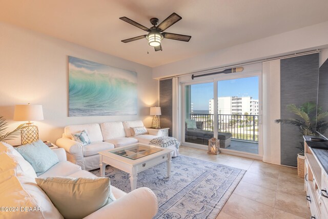 tiled living room featuring ceiling fan