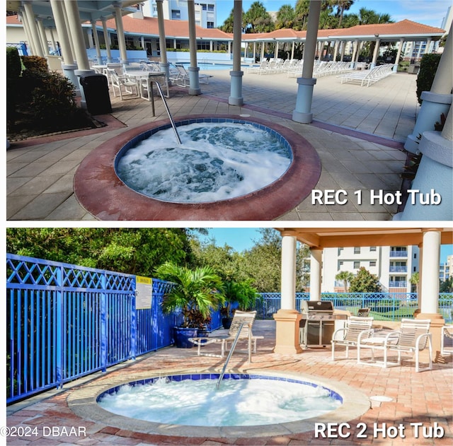 view of pool featuring a hot tub, a patio area, and grilling area