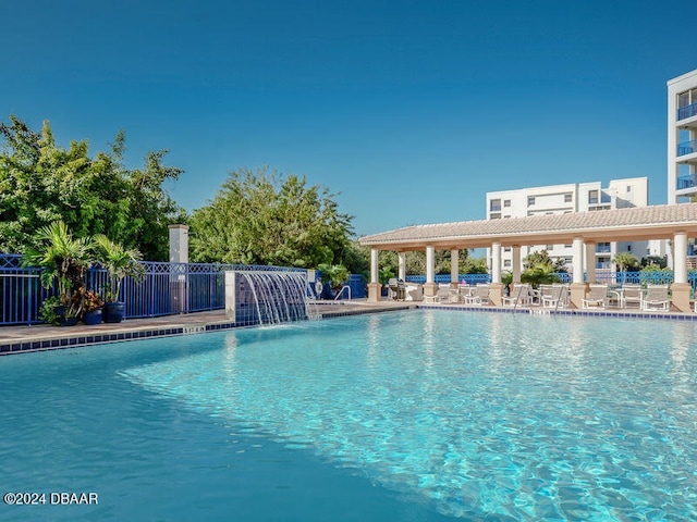 pool featuring fence