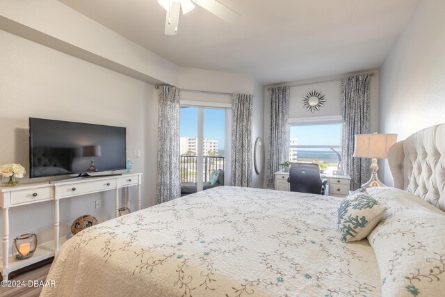 bedroom with wood-type flooring and ceiling fan