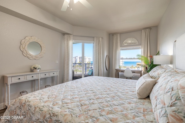 bedroom featuring ceiling fan, multiple windows, and access to exterior