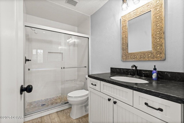 232 Chippewa Cir, Ormond Beach, FL 32174 - full bath with vanity, a shower stall, and wood finished floors