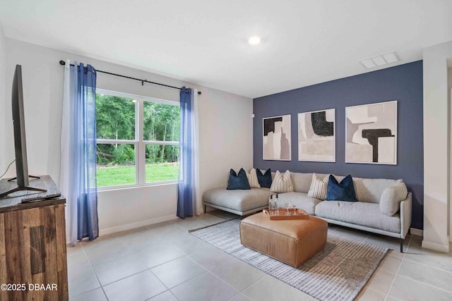 living room with light tile patterned floors