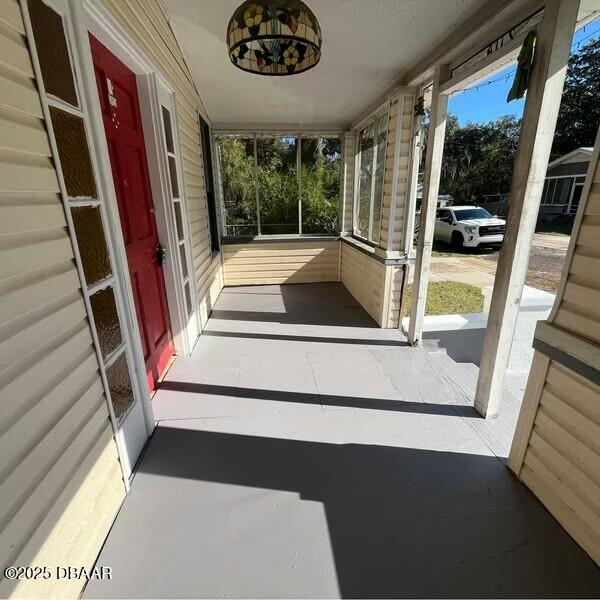 view of unfurnished sunroom