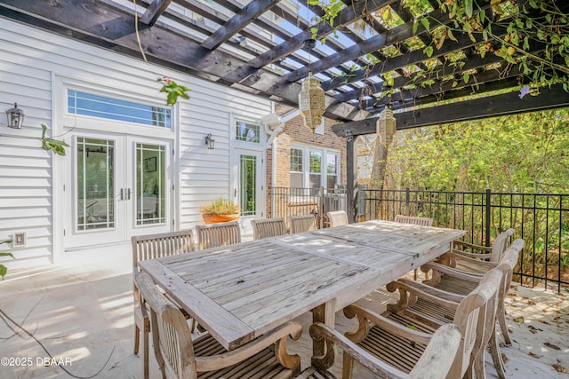 view of patio with fence, a pergola, and outdoor dining space