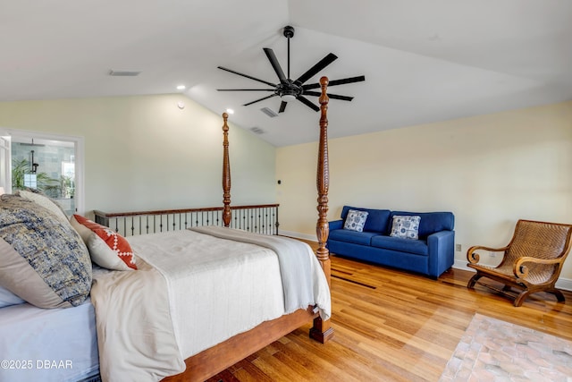 bedroom with baseboards, visible vents, ceiling fan, vaulted ceiling, and light wood-style floors