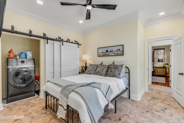 bedroom featuring washer / dryer, recessed lighting, crown molding, and a barn door