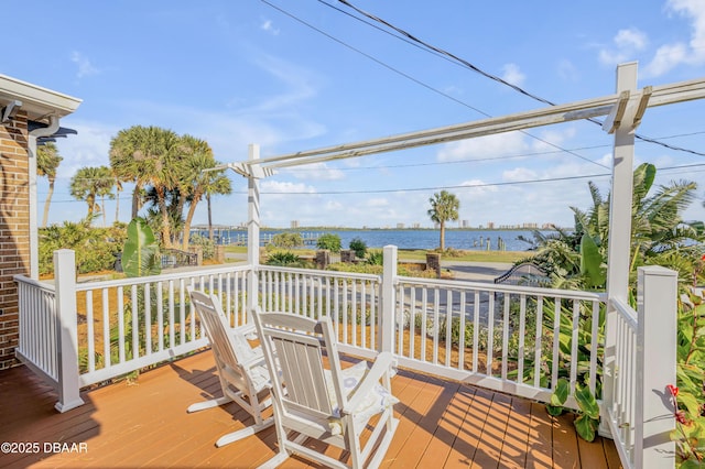 deck featuring a water view