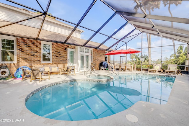 outdoor pool featuring an outdoor hangout area, glass enclosure, a patio area, and a grill