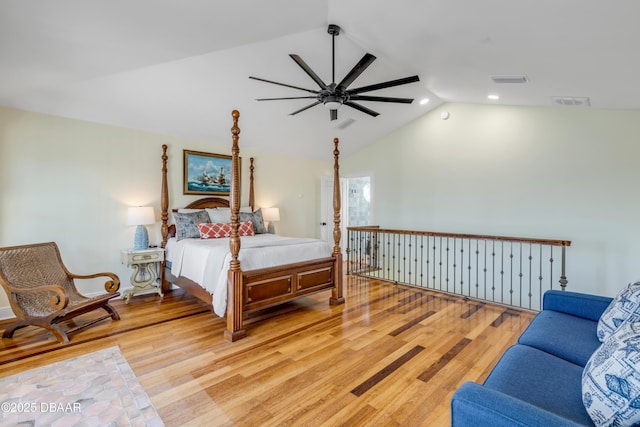 bedroom featuring light wood-type flooring, visible vents, vaulted ceiling, and recessed lighting