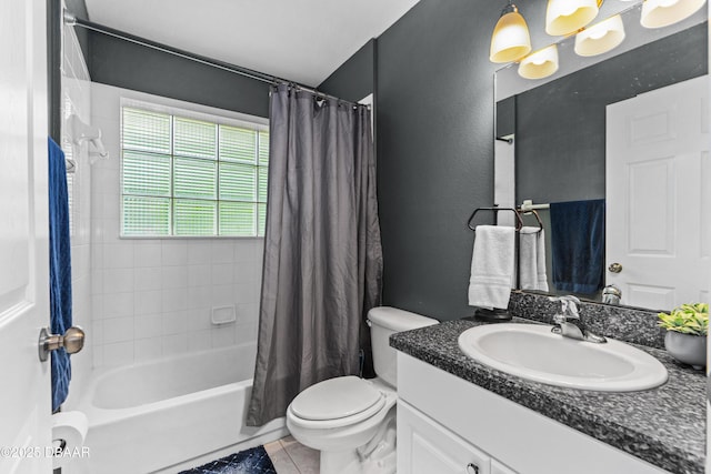 bathroom with toilet, tile patterned flooring, shower / tub combo with curtain, and vanity