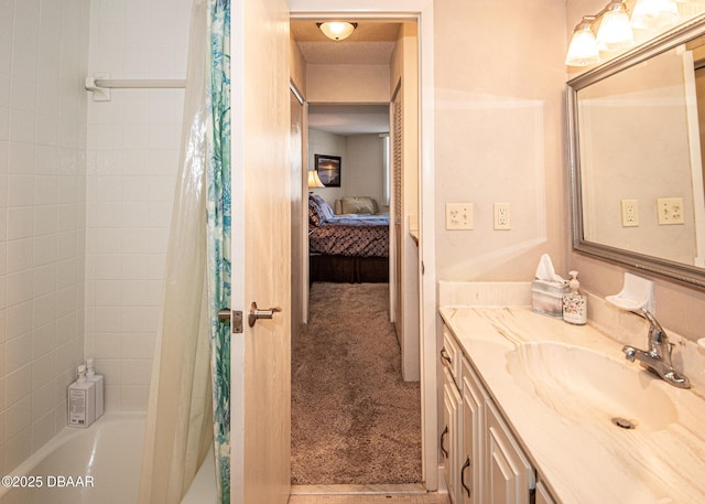 bathroom with vanity and shower / tub combo