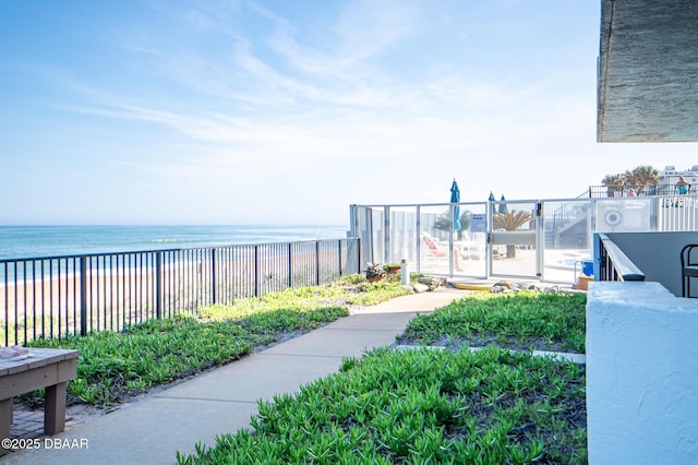 exterior space featuring a beach view