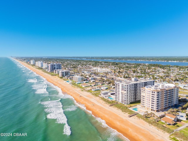 aerial view featuring a water view and a beach view