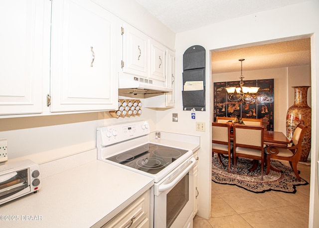 kitchen featuring white cabinetry, hanging light fixtures, a chandelier, and white electric range oven