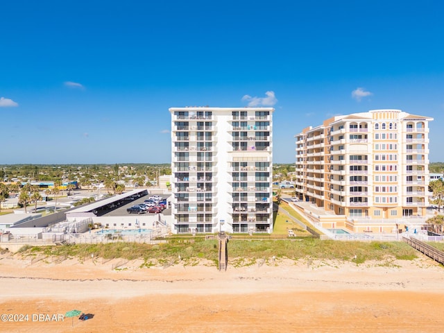 view of property featuring a view of the beach