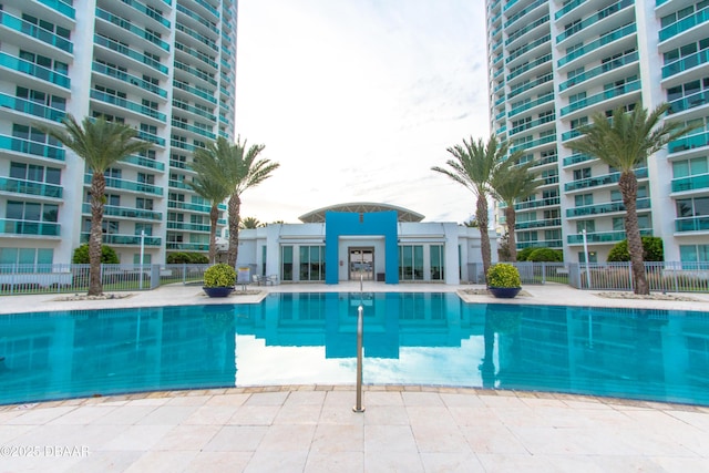 view of swimming pool with a patio area