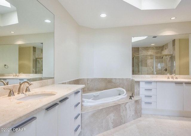 bathroom with independent shower and bath, tile patterned flooring, and vanity