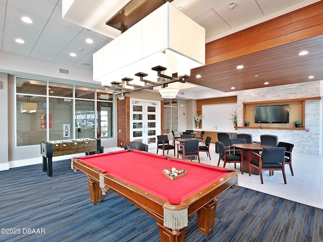 game room with pool table, french doors, and dark colored carpet