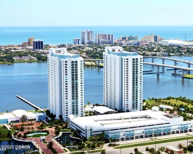 birds eye view of property featuring a water view