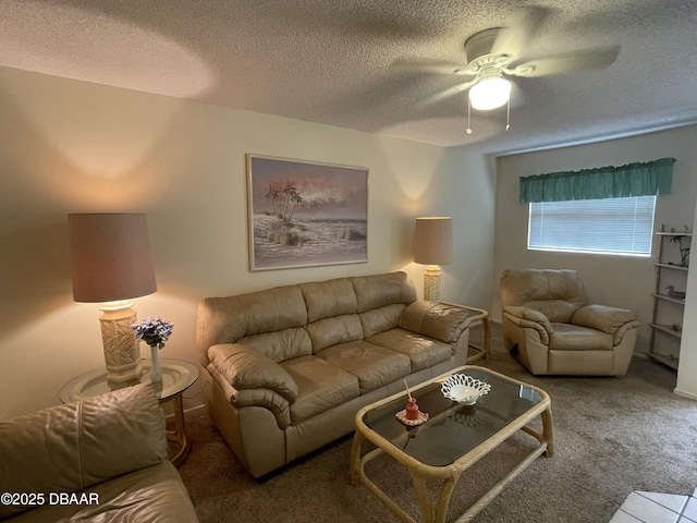 living room featuring a textured ceiling, light colored carpet, and ceiling fan