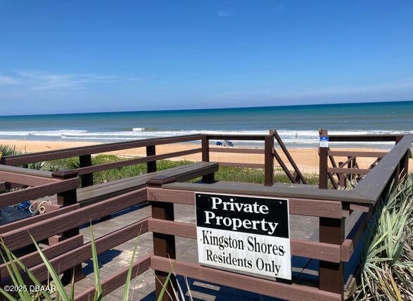 property view of water featuring a view of the beach