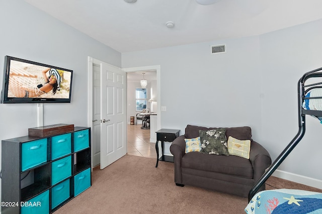 interior space featuring visible vents, carpet flooring, baseboards, and tile patterned flooring