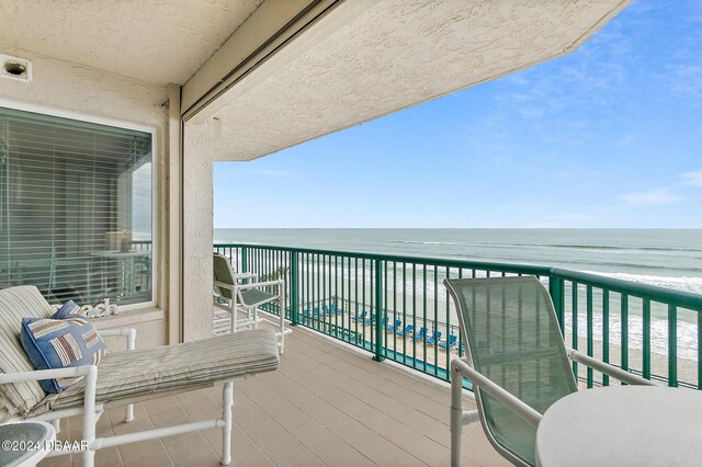 3311 S Atlantic Ave Unit 304, Daytona Beach Shores, FL 32118 - balcony with a water view and a view of the beach