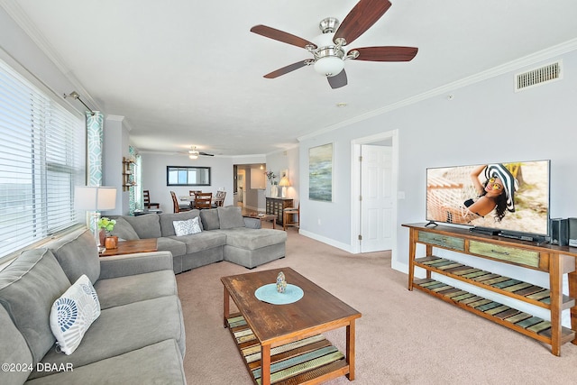 3311 S Atlantic Ave Unit 304, Daytona Beach Shores, FL 32118 - living room with visible vents, ornamental molding, ceiling fan, and light colored carpet