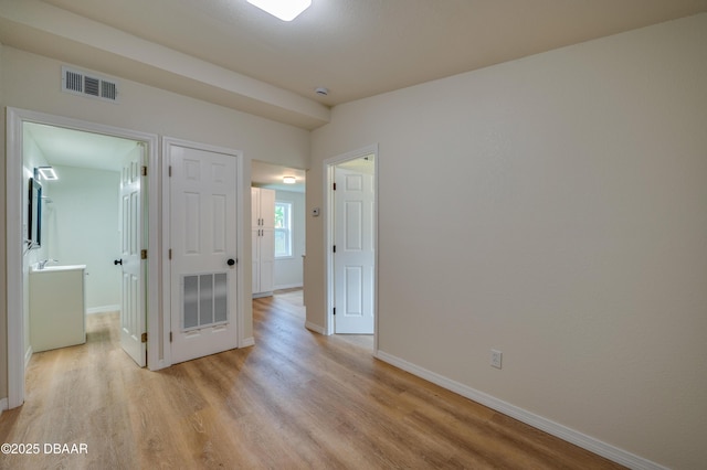 259 Jefferson St, Daytona Beach, FL 32114 - unfurnished room featuring light wood finished floors and a smoke detector