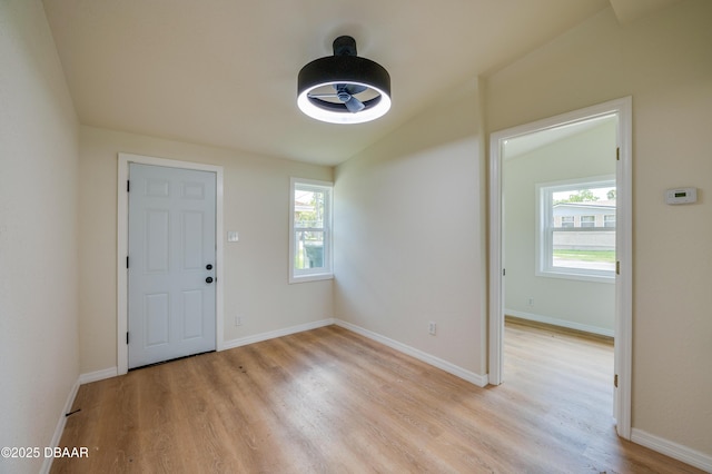 259 Jefferson St, Daytona Beach, FL 32114 - entrance foyer featuring light wood-style flooring and baseboards