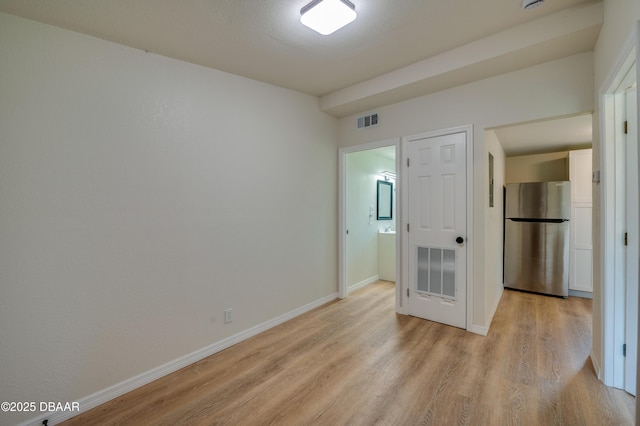 259 Jefferson St, Daytona Beach, FL 32114 - unfurnished room featuring light wood-style flooring and a smoke detector