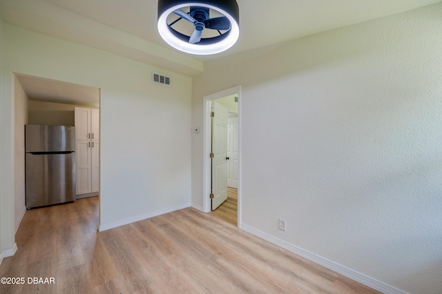 259 Jefferson St, Daytona Beach, FL 32114 - empty room with light wood-type flooring and baseboards