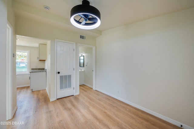 259 Jefferson St, Daytona Beach, FL 32114 - empty room featuring light wood-type flooring and a smoke detector