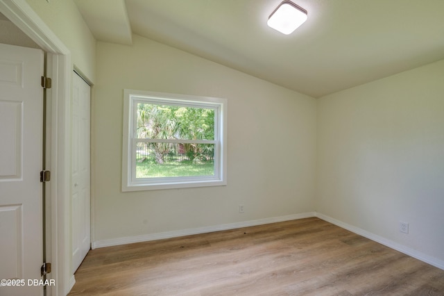 259 Jefferson St, Daytona Beach, FL 32114 - spare room featuring lofted ceiling and light wood finished floors