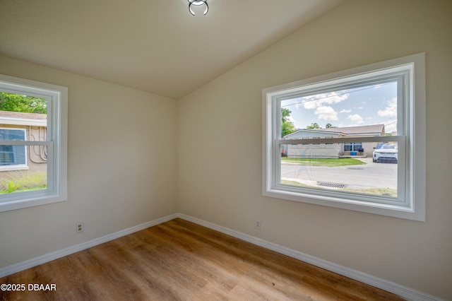 259 Jefferson St, Daytona Beach, FL 32114 - spare room with lofted ceiling and wood finished floors
