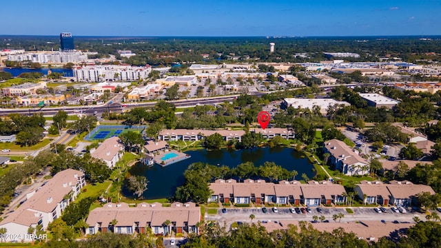 drone / aerial view with a water view