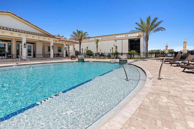 view of pool with a patio