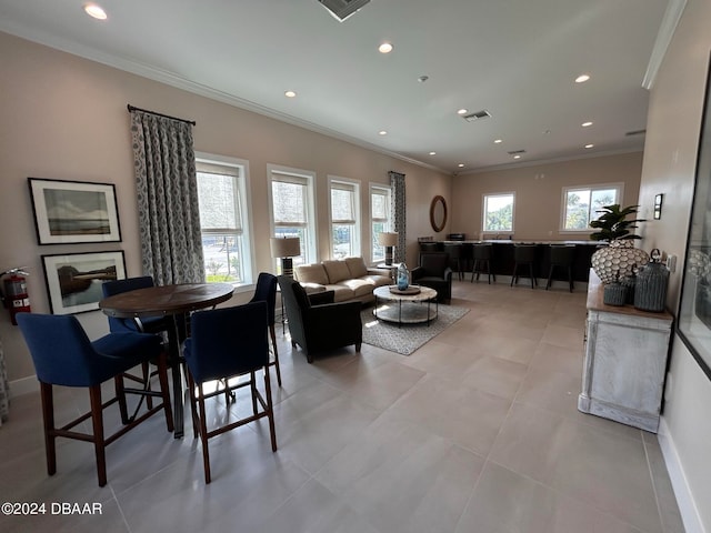 tiled living room with ornamental molding