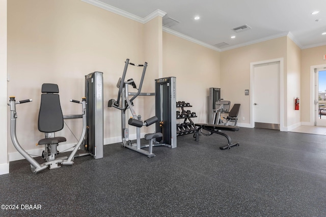 workout area with crown molding