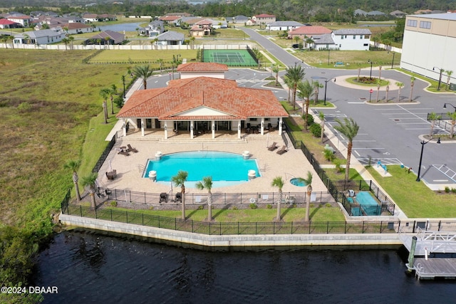 birds eye view of property featuring a water view