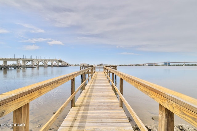 view of dock with a water view