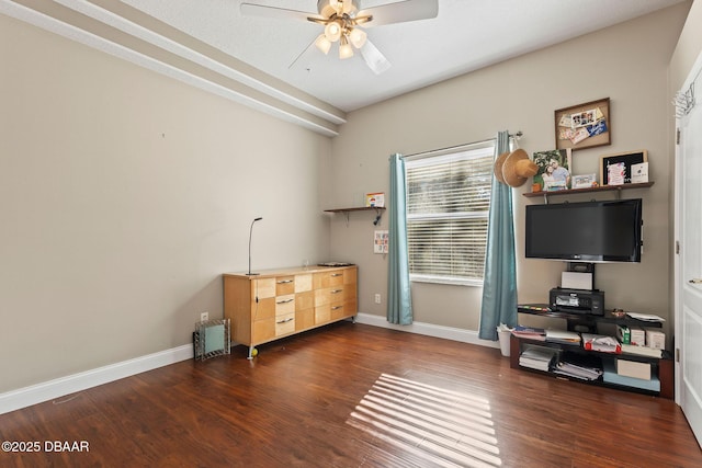 office area featuring baseboards, a ceiling fan, and wood finished floors