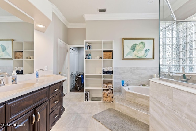 full bathroom with a garden tub, visible vents, crown molding, tile patterned flooring, and vanity